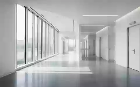 Ein minimalistischer, moderner Innenraum eines medizinischen Forschungszentrums mit klaren Linien und hellem Tageslicht. - Foto: über boerse-global.de