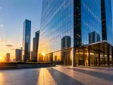 Ein modernes Hochhaus in einem Finanzviertel bei Sonnenuntergang, das den Börsengang und die Marktdominanz symbolisiert. - Foto: über boerse-global.de