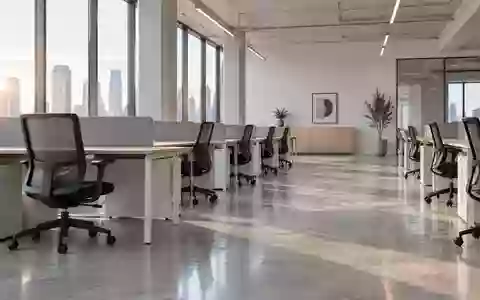 Ein minimalistisch gestalteter, leerer Büroarbeitsbereich mit modernen Schreibtischen und natürlichem Lichteinfall. - Foto: über boerse-global.de