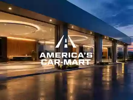 Moderne Autohaus-Architektur bei Dämmerung als Symbol für Automobilhandel und Finanzierung - Foto: über boerse-global.de
