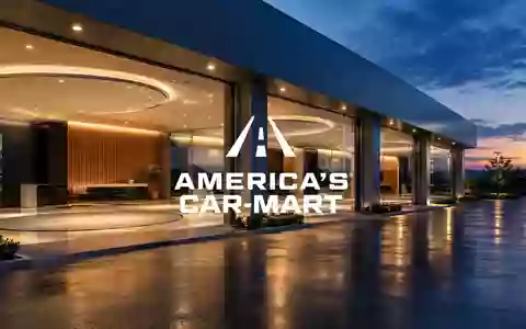 Moderne Autohaus-Architektur bei Dämmerung als Symbol für Automobilhandel und Finanzierung - Foto: über boerse-global.de