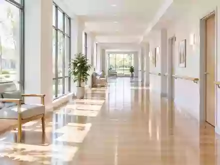 Ein heller, moderner Flur in einer Pflegeeinrichtung mit natürlichem Lichteinfall und minimalistischer Architektur. - Foto: über boerse-global.de