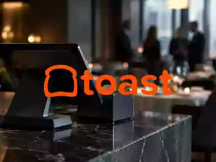 Modernes Kassensystem in einem Restaurant vor verschwommenem Hintergrund, das eine Atmosphäre rechtlicher Prüfung vermittelt. - Foto: über boerse-global.de