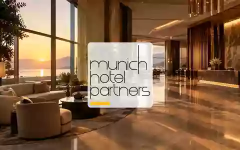 Elegante, modern gestaltete Hotellobby mit atmosphärischer Beleuchtung als Symbol für den Gastgewerbesektor. - Foto: über boerse-global.de