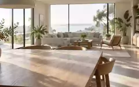 Ein helles, modern eingerichtetes Wohnzimmer mit einem leeren Holztisch und natürlichem Tageslicht. - Foto: über boerse-global.de
