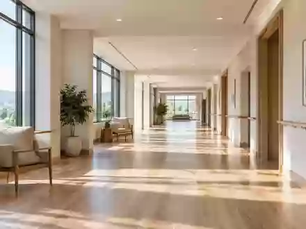 Ein heller, moderner Flur in einer Pflegeeinrichtung mit natürlichem Lichteinfall und minimalistischer Architektur. - Foto: über boerse-global.de