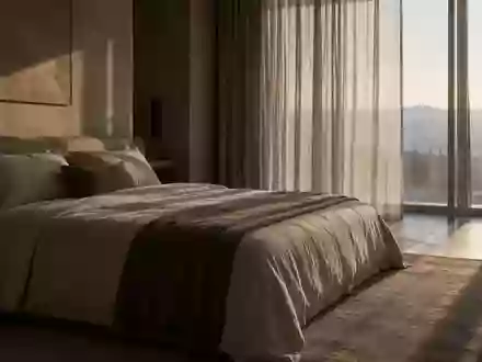 Ein ruhig gestaltetes Schlafzimmer im sanften Morgenlicht, das eine Atmosphäre von Ruhe und nächtlicher Erholung vermittelt. - Foto: über boerse-global.de