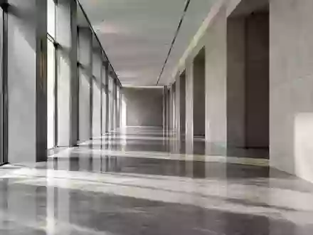 Ein minimalistischer, moderner Flur in einem Finanzinstitut mit klaren architektonischen Linien und natürlichem Licht. - Foto: über boerse-global.de