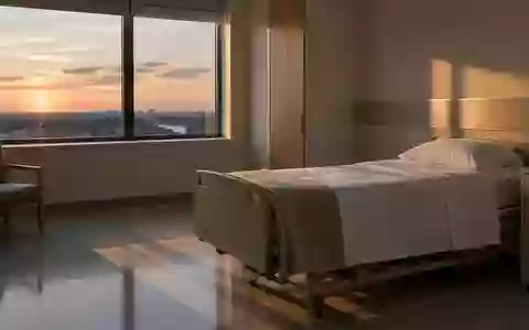Ein ruhiges, minimalistisches Krankenzimmer in natürlichem Licht zur Abenddämmerung. - Foto: über boerse-global.de