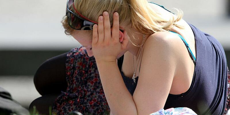 Junge Frau auf einer Wiese (Archiv) - Foto: über dts Nachrichtenagentur