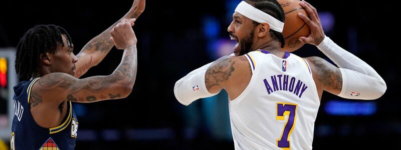 Los Angeles Lakers-Forward Carmelo Anthony (r) schützt den Ball vor Nuggets-Guard Bones Hyland. - Foto: Mark J. Terrill/AP/dpa