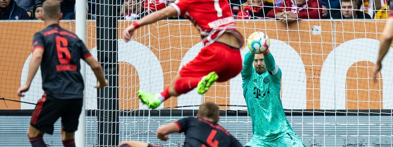 Münchens Joshua Kimmich (l) jubelt nach seinem Tor zum 1:2 mit Münchens Serge Gnabry (r). - Foto: Tom Weller/dpa