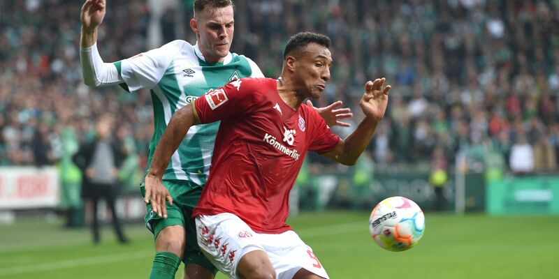 Marvin Ducksch (verdeckt) ließ Mainz-Schlussmann Robin Zentner bei Werders Führung keine Chance. - Foto: Carmen Jaspersen/dpa