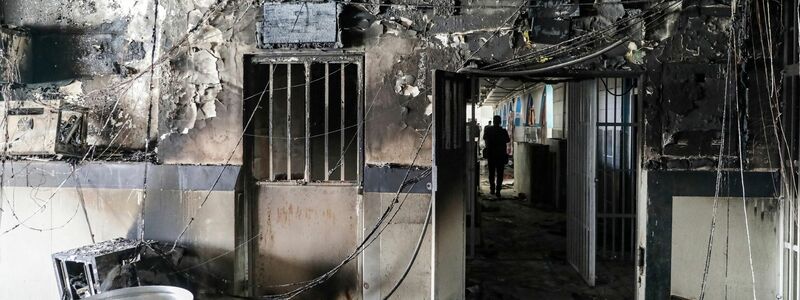 Durch das Feuer zerstörte Werkstatt im Ewin-Gefängnis. - Foto: Koosha Mahshid Falahi/Mizan News Agency/AP/dpa