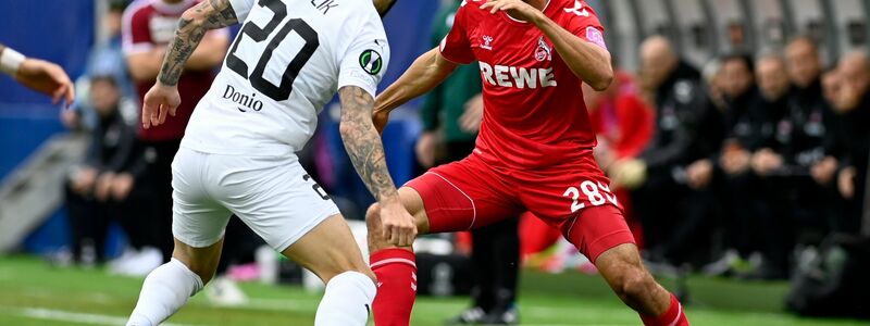 Kölns Ellyes Skhiri (r) im Kampf um den Ball mit Slovackos Marek Havlik. - Foto: Dalibor Gluck/CTK/AP/dpa