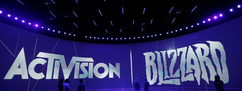 Der Stand von Activision Blizzard auf der Electronic Entertainment Expo. Microsoft muss sich bei der Übernahme des Videospiele-Riesen Activision Blizzard auf längere Untersuchungen in Großbritannien einstellen. - Foto: Jae C. Hong/AP/dpa