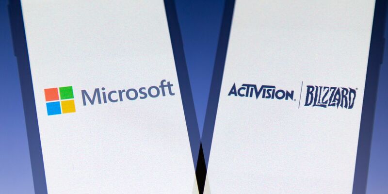 Die Logos des amerikanischen multinationalen Technologiekonzerns Microsoft und des Videospielunternehmens Activision Blizzard. - Foto: Andre M. Chang/ZUMA Press Wire/dpa