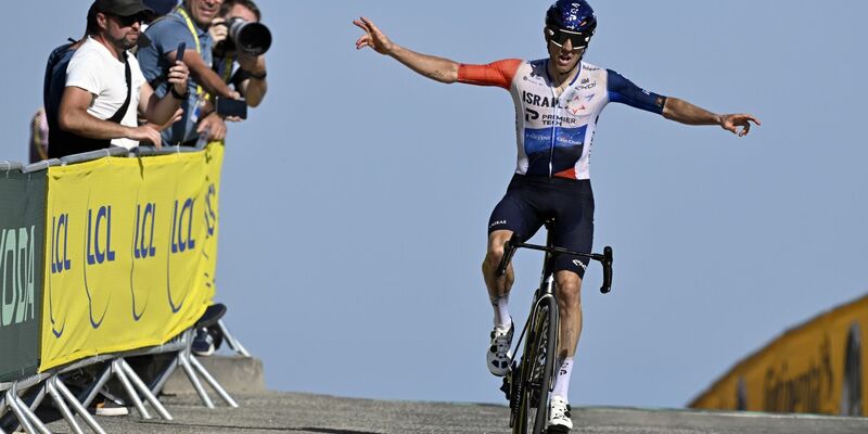 Siegte auf dem Puy de Dome: Michael Woods. - Foto: Dirk Waem/Belga/dpa