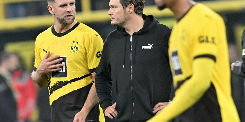 Frustriert: BVB-Coach Edin Terzic (M) und Neuzugang Niclas Füllkrug. - Foto: Bernd Thissen/dpa