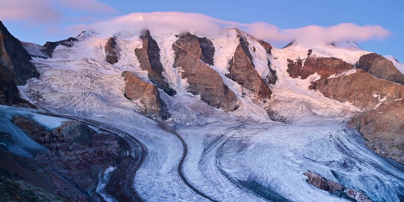 Der Piz Palü in der Abenddämmerung - wie es hier wohl in zehn Jahren aussehen wird? - Foto: Jürg Kaufmann/Glaciers.Today/dpa