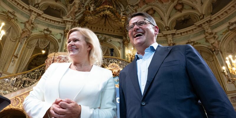 Die Spitzenkandidaten für die Landtagswahl in Hessen: Nancy Faeser (SPD) und Boris Rhein (CDU). - Foto: Boris Roessler/dpa