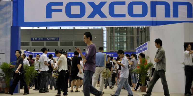 Angestellte eines Foxconn-Werkes. - Foto: Xuan Hui/FEATURECHINA/dpa