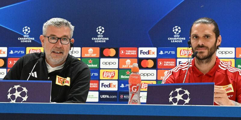 Union-Trainer Urs Fischer (l) und Kapitän Christopher Trimmel bei der Pressekonferenz in Madrid. - Foto: Matthias Koch/dpa