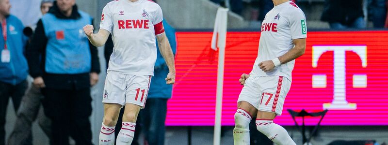 Leart Paqarada (r) und Florian Kainz bejubeln einen Kölner Treffer. - Foto: Rolf Vennenbernd/dpa