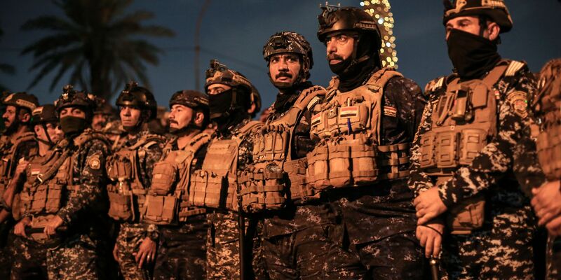 Während einer Demonstration zur Unterstützung der Palästinenser und gegen die US-Unterstützung für Israel stehen irakische Soldaten in der Nähe der US-Botschaft in Bagdad Wache. (Archivbild) - Foto: Ameer Al-Mohammedawi/dpa