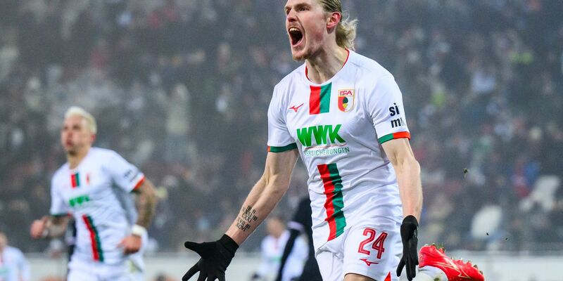 Brachte Augsburg gegen Frankfurt in Führung: Fredrik Jensen. - Foto: Tom Weller/dpa