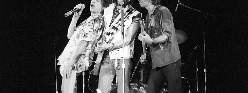 Mick Jagger (l-r), Ron Wood und Keith Richards im Juni 1982. - Foto: Roland Holschneider/dpa