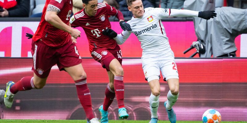Bayern Münchens Jamal Musiala (l) und der Leverkusener Florian Wirtz treffen am Samstag wieder aufeinander. - Foto: Sven Hoppe/dpa