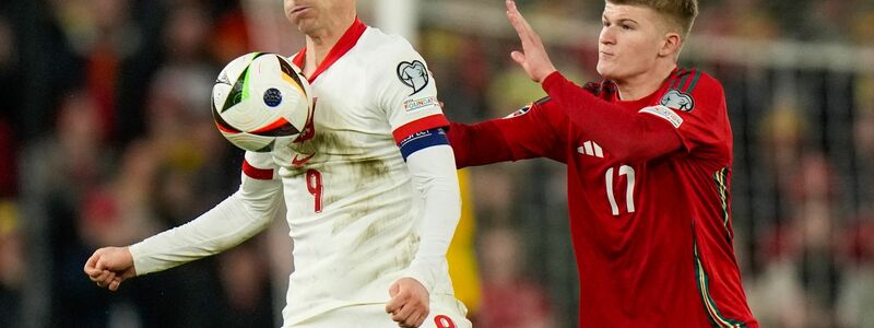 Polen um Superstar Robert Lewandowski (l) setzte sich im Elfmeterschießen gegen Wales durch. - Foto: Alastair Grant/AP/dpa