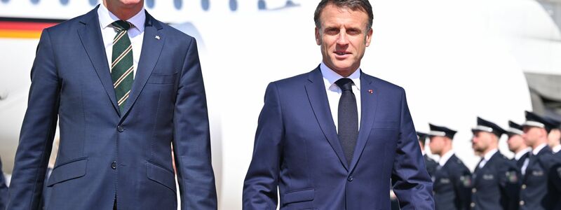 NRW-Ministerpräsident Hendrik Wüst (l) empfängt Emmanuel Macron. - Foto: David Inderlied/dpa