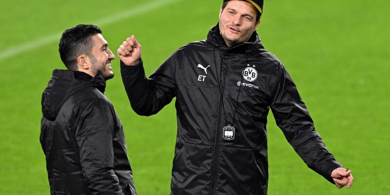 Nuri Sahin (l) folgt Edin Terzic und wird neuer BVB-Trainer. - Foto: Federico Gambarini/dpa