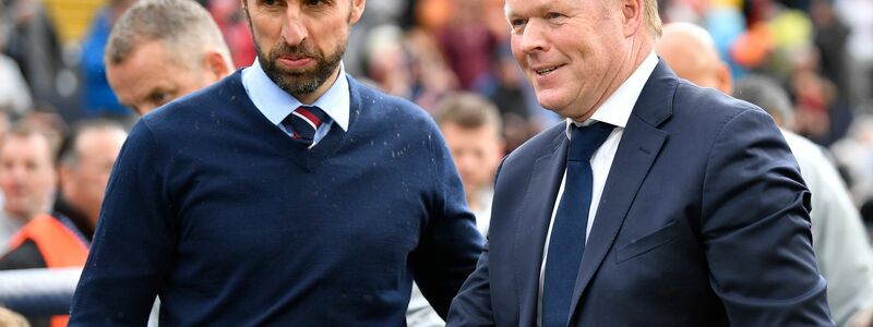 Treffen im EM-Halbfinale aufeinander: Englands Trainer Gareth Southgate (l) und Oranje-Coach Ronald Koeman. - Foto: Martin Meissner/AP/dpa