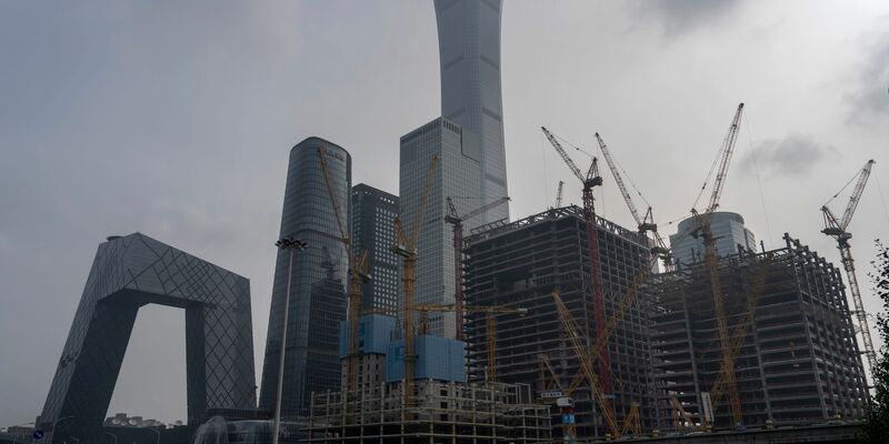 Baustellen im zentralen Geschäftsviertel von Peking: China hat für sien Wirt - Foto: Ng Han Guan/AP/dpa