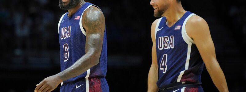 Laufen für die USA auf: NBA-Superstar James und Curry. - Foto: Kin Cheung/AP/dpa