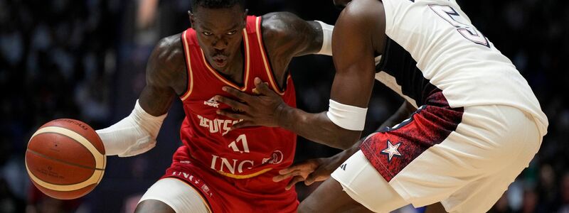 Dennis Schröder attackiert die Defense der USA. - Foto: Alastair Grant/AP