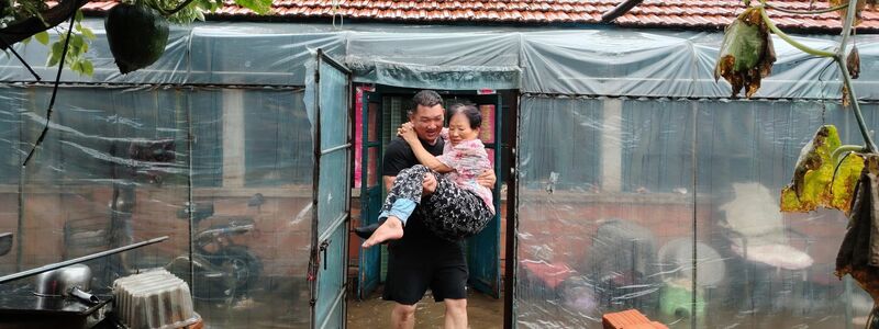 Viele Menschen müssen aus den Überflutungsgebieten evakuiert werden.  - Foto: ---/XinHua/dpa