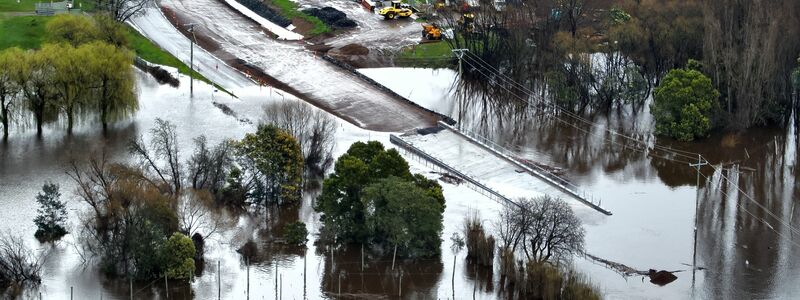 Stromausfälle, Evakuierungen und überschwemmtes Land: Die Unwetter haben Down Under fest im Griff. - Foto: -/TASMANIA STATE EMERGENCY SERVICE/AAP/dpa