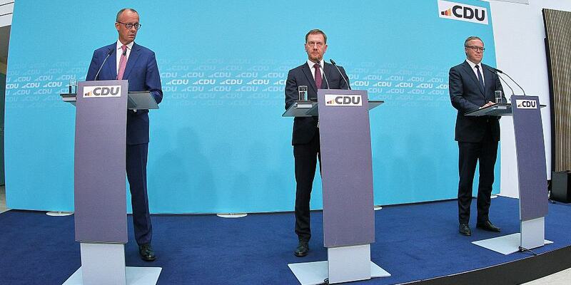 Friedrich Merz, Michael Kretschmer, Mario Voigt am 02.09.2024 - Foto: über dts Nachrichtenagentur