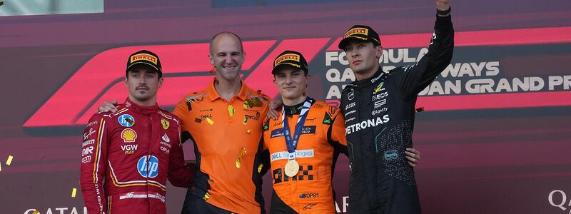 Oscar Piastri (M) gewann in Baku vor Charles Leclerc (l) und George Russell (r). - Foto: Hasan Bratic/dpa