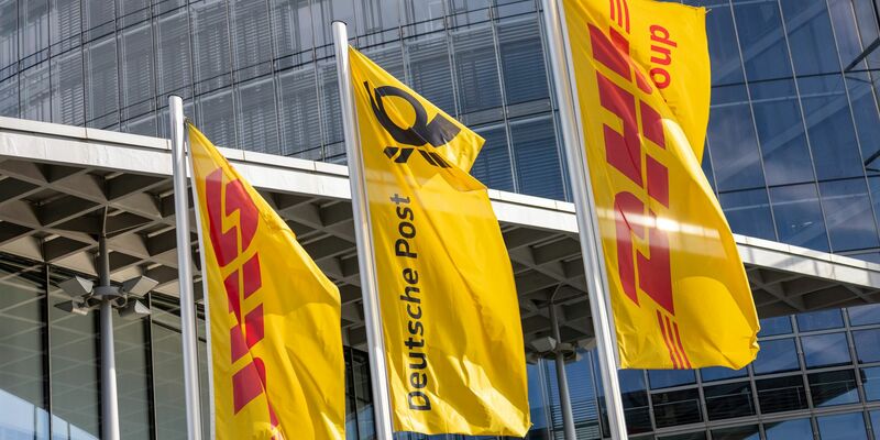Die DHL Group hat weltweit rund 600.000 Mitarbeiterinnen. - Foto: Thomas Banneyer/dpa