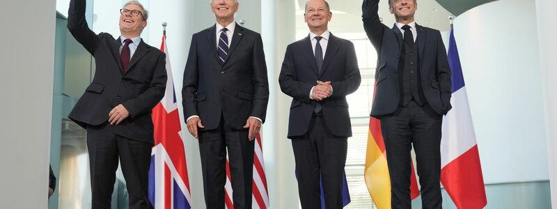 Biden und Scholz trafen sich auch mit dem französischen Präsidenten und dem britischen Premier. - Foto: Michael Kappeler/dpa