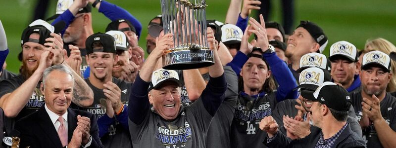 Die Los Angeles Dodgers feiern mit der Trophäe ihren Sieg in der World Series. - Foto: Seth Wenig/AP/dpa