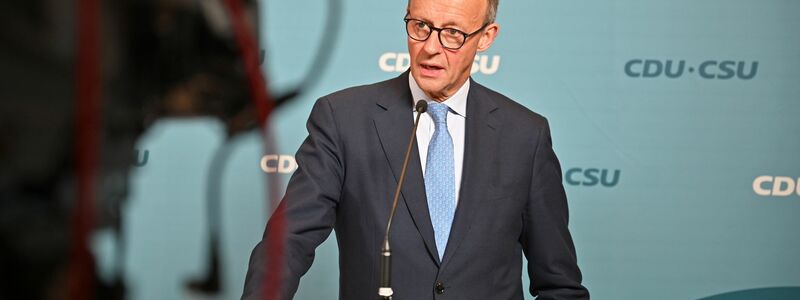 CDU-Chef Friedrich Merz zeigt sich am Ende zufrieden mit dem Wahltermin - Foto: Anna Ross/dpa