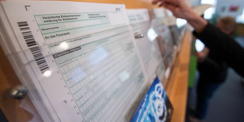 SPD, Grüne und FDP wollen Entlastungen für die Bürger beschließen. (Archivfoto) - Foto: Marijan Murat/dpa