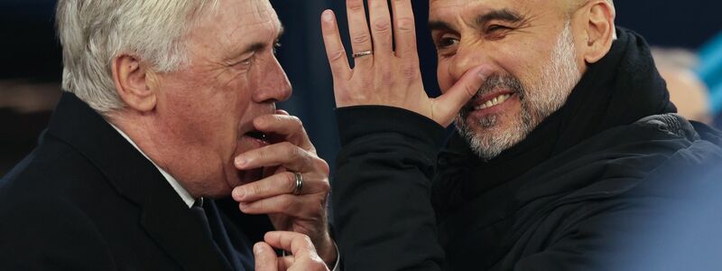 Nur einer wird nach dem nächsten Duell von Carlo Ancelotti (l) und Pep Guardiola noch lachen. - Foto: Darren Staples/AP/dpa