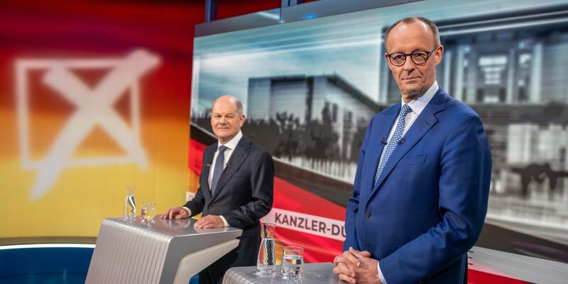 Scholz und Merz wollen arbeitsunwillige Bürgergeldempfänger schärfer sanktionieren. - Foto: Michael Kappeler/dpa-Pool/dpa